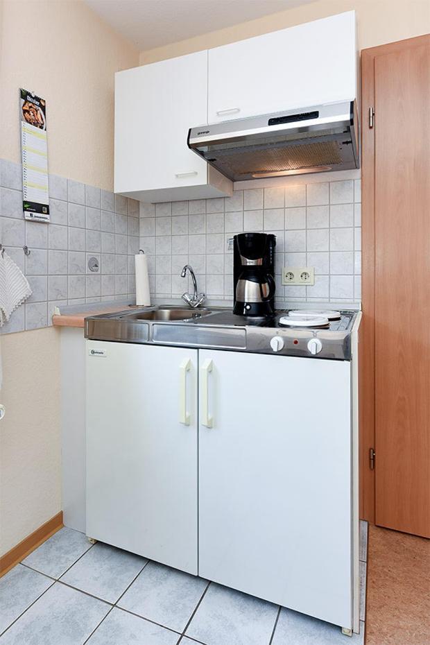 Ferienwohnungen Im Haus Nordseebrise Neuharlingersiel Exterior foto